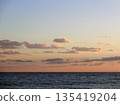 Evening sky and calm seascape 135419204