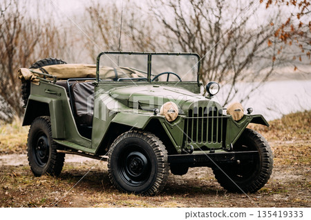Russian Soviet World War II Four-wheel Drive Army Truck Gaz-67 Car In Forest 135419333