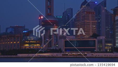Iconic Shanghai Landmarks Captured During Evening Glow with City Lights Shining Iconic Shanghai Landmarks Captured During Evening Glow with City Lights Shining 135419694