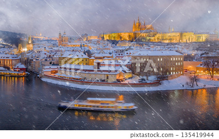 High Resolution Panorama Picture of Winter Snowy Prague Old Town with Prague Castle and Charles Bridge above River Vltava during Sunset , Czech republic 135419944