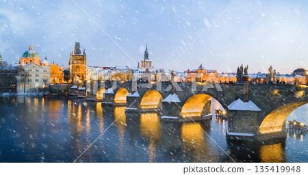 High Resolution Panorama Picture of Winter Snowy Prague Old Town with Prague Castle and Charles Bridge above River Vltava during Sunset , Czech republic 135419948