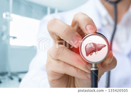 Doctor examines liver health. 135420505