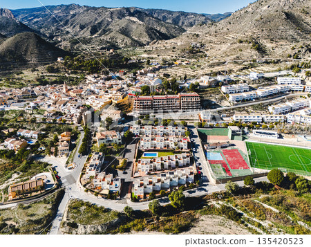 Aerial view of Relleu village surrounded by rugged mountains Aerial view of Relleu village surrounded by rugged mountains 135420523