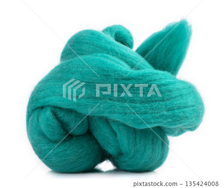 Hank merino wool green on a white background Hank merino wool green on a white background 135424008