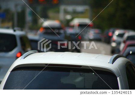 Heavy traffic congestion on highway with cars, tunnels, and traffic signals. Heavy traffic congestion on highway with cars, tunnels, and traffic signals. 135424015