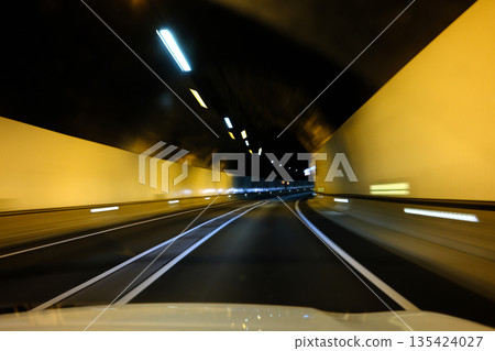 Heavy traffic congestion on highway with cars, tunnels, and traffic signals. Heavy traffic congestion on highway with cars, tunnels, and traffic signals. 135424027