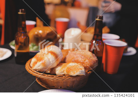 Friends enjoying a Halloween party at a bar making a toast 135424101