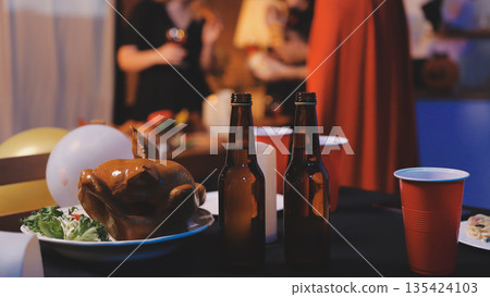 Friends enjoying a Halloween party at a bar making a toast Friends enjoying a Halloween party at a bar making a toast 135424103