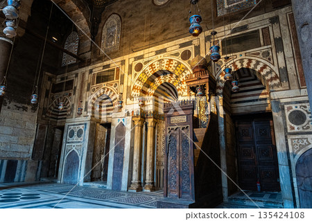Interior view of the Qalawun Complex on Al-Muizz Street. Features intricate Islamic architecture with ornate ceilings and detailed wooden elements 135424108