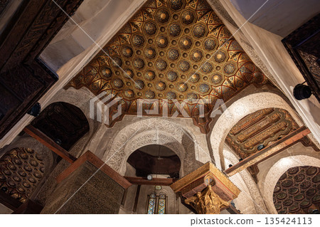 Interior view of the Qalawun Complex on Al-Muizz Street. Features intricate Islamic architecture with ornate ceilings and detailed wooden elements Interior view of the Qalawun Complex on Al-Muizz Street. Features intricate Islamic architecture with ornate ceilings and detailed wooden elements 135424113