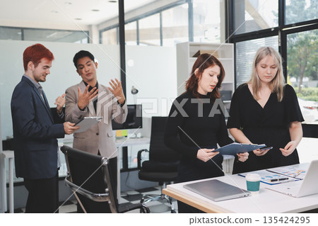 Multiracial business people having meeting 135424295