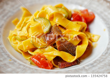 Vegetable and meat tagliatelle Vegetable and meat tagliatelle 135424758