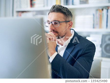 Ceo, employee and man with focus, reading email and consultant in a workplace, research and search internet. Male person, entrepreneur or mature agent with a pc, concentration and website information Ceo, employee and man with focus, reading email and consultant in a workplace, research and search internet. Male person, entrepreneur or mature agent with a pc, concentration and website information 135425490