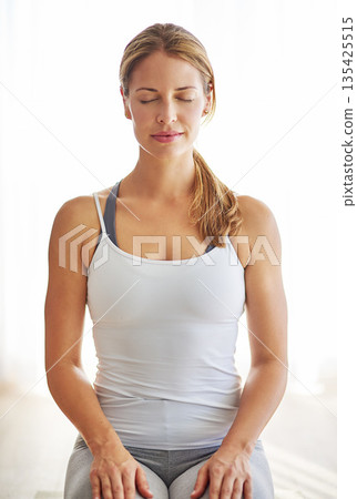 Calm woman, yoga and meditation for zen, spiritual wellness or mental health exercise at home. Relax female person or yogi in peaceful meditating, workout or healthy mindset for awareness indoors Calm woman, yoga and meditation for zen, spiritual wellness or mental health exercise at home. Relax female person or yogi in peaceful meditating, workout or healthy mindset for awareness indoors 135425515