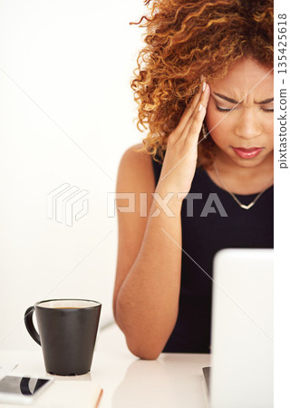 Sad, headache and woman with a laptop email isolated on a white background in a studio. Frustrated, tired and a social media manager with migraine pain from a mental health problem or work mistake 135425618