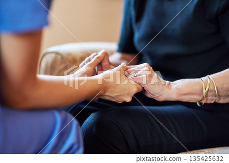 Nurse, senior people and holding hands for support, healthcare service and medical, advice and empathy. Professional doctor, helping and retirement nursing for elderly person in together sign closeup 135425632