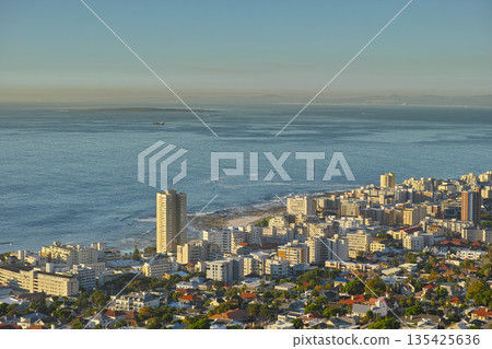 Cityscape, urban buildings and architecture by ocean, infrastructure and property development in metro. Skyline, cbd and seaside with city skyscraper, Cape Town and mockup space in summer sunshine Cityscape, urban buildings and architecture by ocean, infrastructure and property development in metro. Skyline, cbd and seaside with city skyscraper, Cape Town and mockup space in summer sunshine 135425636