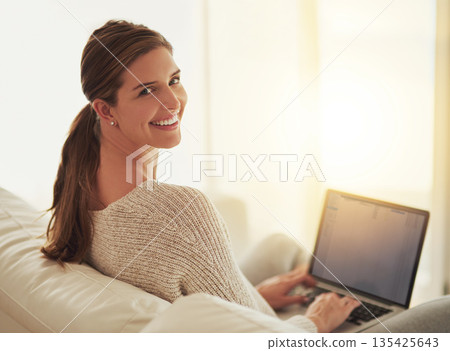 Laptop, remote work and portrait of happy woman on sofa in home living room. Computer, freelancer and face of person on couch writing blog, working on project or social media, email and web research. Laptop, remote work and portrait of happy woman on sofa in home living room. Computer, freelancer and face of person on couch writing blog, working on project or social media, email and web research. 135425643