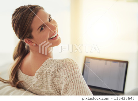 Remote work, laptop and portrait of woman on sofa in home living room. Computer, freelancer and excited face of person from Canada on couch working on project for social media, email or mockup space. Remote work, laptop and portrait of woman on sofa in home living room. Computer, freelancer and excited face of person from Canada on couch working on project for social media, email or mockup space. 135425645