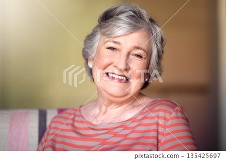Portrait, nursing home and happy senior woman in living room, laughing in house or relax in retirement. Elderly lady, happiness and healthy person smile for funny, joke or freedom of retired life 135425697