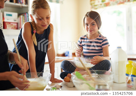 Parent, portrait or happy kids baking in kitchen as a family with siblings learning cookies recipe at home. Girl, cooking or baker helping or teaching children to bake together for child development 135425706