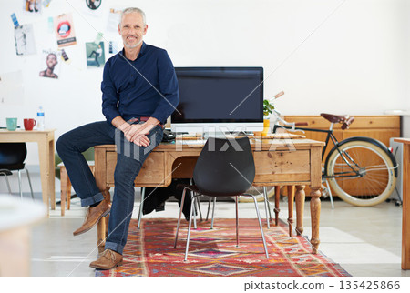 Portrait, office and creative business man for graphic design career, workspace confidence and startup mindset. Professional manager, boss or designer person relax on desk with computer in creativity Portrait, office and creative business man for graphic design career, workspace confidence and startup mindset. Professional manager, boss or designer person relax on desk with computer in creativity 135425866