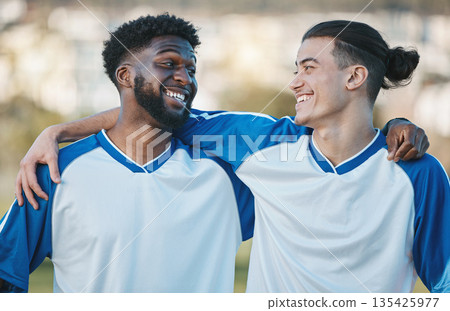 Fitness, soccer and friends with sports men hugging during training, a game or competition outdoor. Football, exercise or workout with a young man athlete and his friend happy together after a match Fitness, soccer and friends with sports men hugging during training, a game or competition outdoor. Football, exercise or workout with a young man athlete and his friend happy together after a match 135425977