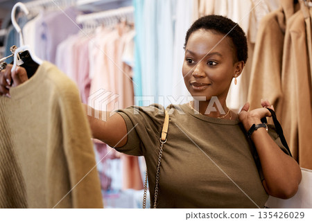 Fashion, shopping and smile with black woman in boutique store for luxury, sale and retail. Choice, product and consumerism with female customer buying in mall for shopaholic, purchase and clothes Fashion, shopping and smile with black woman in boutique store for luxury, sale and retail. Choice, product and consumerism with female customer buying in mall for shopaholic, purchase and clothes 135426029