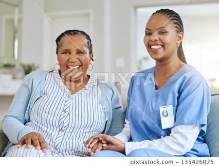 Senior woman, nurse and holding hands portrait for support, healthcare and happiness at retirement home. Elderly black person and caregiver together for trust, elderly care and help with homecare Senior woman, nurse and holding hands portrait for support, healthcare and happiness at retirement home. Elderly black person and caregiver together for trust, elderly care and help with homecare 135426075