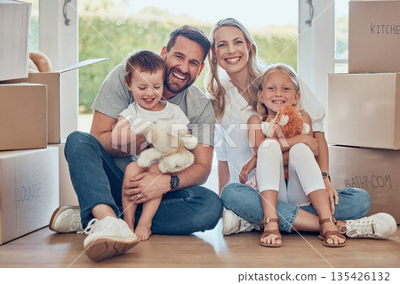 Portrait, happy family and kids on floor of new home, real estate and property loan for relocation. Children, parents and moving in together for building investment, mortgage and boxes in apartment Portrait, happy family and kids on floor of new home, real estate and property loan for relocation. Children, parents and moving in together for building investment, mortgage and boxes in apartment 135426132