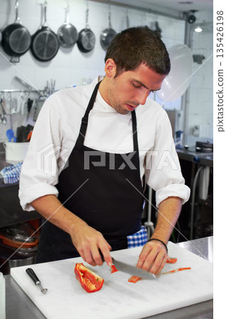 Chef, cooking and cutting with man in kitchen for luxury, hospitality and food catering. Fine dining, gourmet and dinner with male cook in hotel restaurant for menu, cuisine and meal preparation Chef, cooking and cutting with man in kitchen for luxury, hospitality and food catering. Fine dining, gourmet and dinner with male cook in hotel restaurant for menu, cuisine and meal preparation 135426198