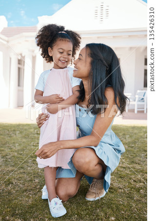 Mother, smile and hug girl outdoor at home backyard, bonding and having fun. Happy, daughter and mom embrace with child for love, care for kid and enjoying quality time together on holiday vacation. Mother, smile and hug girl outdoor at home backyard, bonding and having fun. Happy, daughter and mom embrace with child for love, care for kid and enjoying quality time together on holiday vacation. 135426310