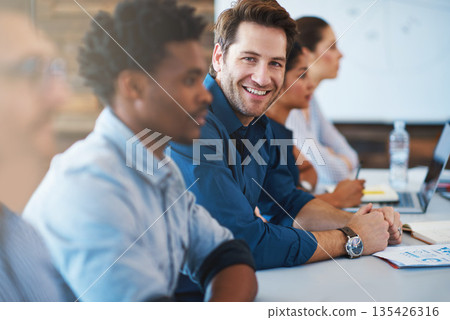 Portrait, happy and a business man in the boardroom with his team during a meeting for planning. Smile, strategy or collaboration with a male employee and colleagues in the office for a seminar Portrait, happy and a business man in the boardroom with his team during a meeting for planning. Smile, strategy or collaboration with a male employee and colleagues in the office for a seminar 135426316