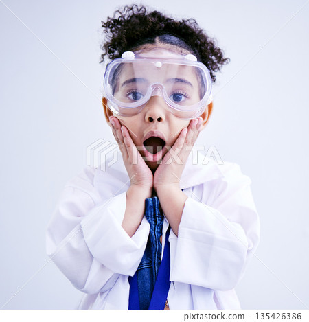 Child, shocked and science portrait with glasses in studio with open mouth, wow or surprised face. African kid student excited for education or biology experiment and learning for future scientist Child, shocked and science portrait with glasses in studio with open mouth, wow or surprised face. African kid student excited for education or biology experiment and learning for future scientist 135426386
