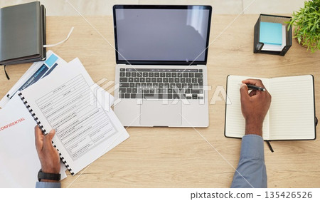 Research, mockup and laptop screen with hands of lawyer in office for writing, justice and legal documents. Books, website and advocate with closeup of person in office for attorney and technology 135426526