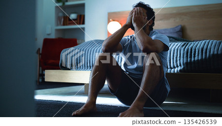 Insomnia, thinking and man in bedroom at night for burnout, exhausted and fatigue for mental health. Tired, dark and person with upset, sad and anxiety for sleepless, bad dream and frustrated in home Insomnia, thinking and man in bedroom at night for burnout, exhausted and fatigue for mental health. Tired, dark and person with upset, sad and anxiety for sleepless, bad dream and frustrated in home 135426539