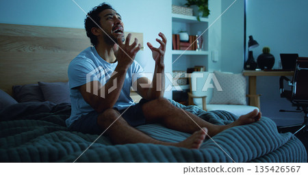 Insomnia, shout and man in bedroom at night for burnout, exhausted and fatigue for mental health. Tired, dark and person with upset, angry and screaming for sleepless, bad dream or frustrated in home 135426567