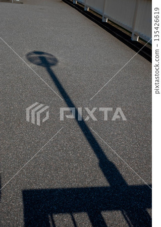 Streetlight shadow 135426619