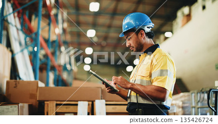 Man, tablet and warehouse inspection for storage, checklist or boxes with inventory management. Person, tech and profile with application, logistics or bokeh with supply chain at distribution plant Man, tablet and warehouse inspection for storage, checklist or boxes with inventory management. Person, tech and profile with application, logistics or bokeh with supply chain at distribution plant 135426724