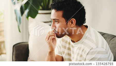 House, biting nails and man on couch, nervous and stress with mental health, thinking and bad habit. Apartment, anxiety and Asian person on sofa, breathing and concern with coping mechanisms or worry House, biting nails and man on couch, nervous and stress with mental health, thinking and bad habit. Apartment, anxiety and Asian person on sofa, breathing and concern with coping mechanisms or worry 135426793