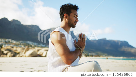 Zen, man and yoga at beach with meditation, prayer hands and peaceful moment for spiritual healing. Calm, person and mindfulness at ocean with mudra, namaste pose and chakra alignment for wellness. Zen, man and yoga at beach with meditation, prayer hands and peaceful moment for spiritual healing. Calm, person and mindfulness at ocean with mudra, namaste pose and chakra alignment for wellness. 135426965