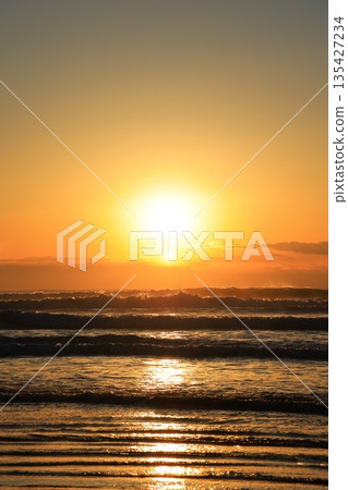 Beach illuminated by the morning sun Beach illuminated by the morning sun 135427234