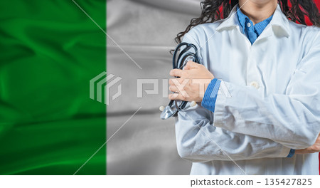Healthcare professional with Italy flag background. Professional doctor holding stethoscope on Italy flag background Healthcare professional with Italy flag background. Professional doctor holding stethoscope on Italy flag background 135427825