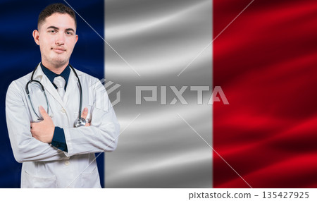 Portrait of medical professional on France flag background. French national health system 135427925