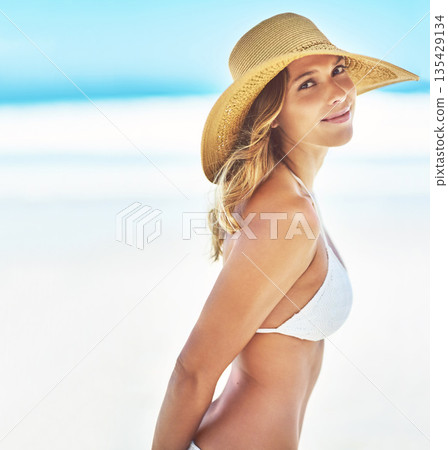 Happy, mockup and portrait of woman at beach for summer vacation, tropical and travel space. Wellness, nature and holiday with face of female tourist and hat at seaside for sunbathing and paradise 135429134