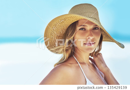 Space, summer and portrait of woman at beach for travel vacation, tropical and relax mockup. Wellness, nature and holiday with face of female tourist and hat at seaside for sunbathing and paradise Space, summer and portrait of woman at beach for travel vacation, tropical and relax mockup. Wellness, nature and holiday with face of female tourist and hat at seaside for sunbathing and paradise 135429139