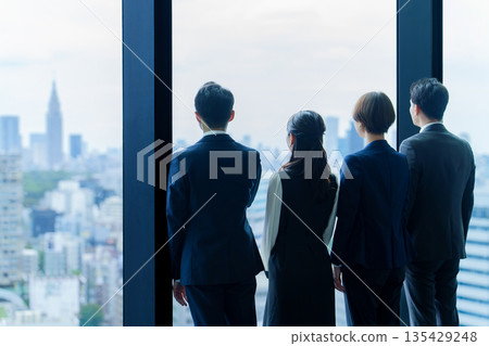 The back of a business person looking at the scenery The back of a business person looking at the scenery 135429248
