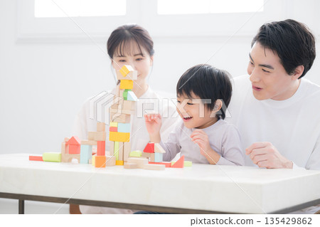 An image of a family nurturing children's curiosity and challenges An image of a family nurturing children's curiosity and challenges 135429862