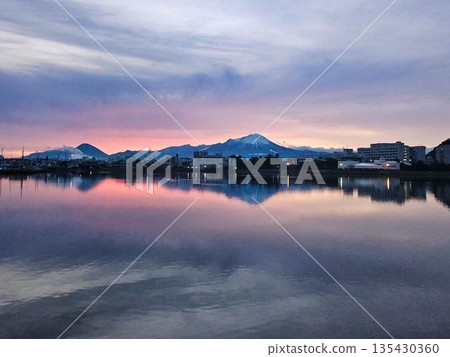 An upside-down view of Mt. Daisen reflected in the sea at dawn An upside-down view of Mt. Daisen reflected in the sea at dawn 135430360