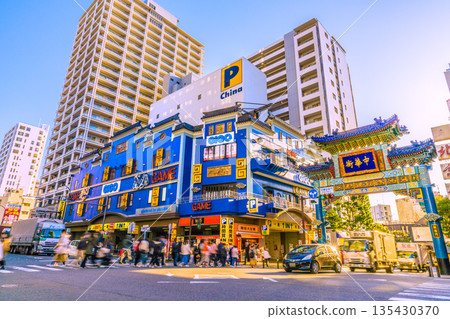 Yokohama cityscape, Japan, January 13th. Sunshine...View of Yokohama Chinatown, Chaoyangmon Gate, and shining passenger cars. A ray of hope for a new era... 135430370